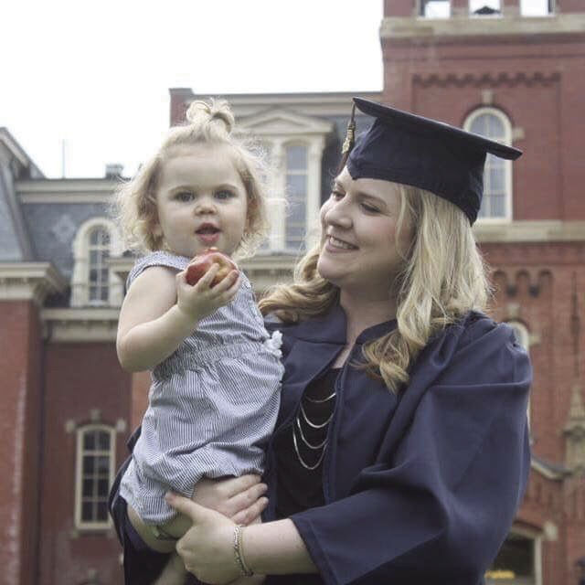A former WVU student with her young daughter